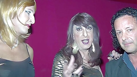 Horny tranny with a big ass takes two cock in her mouth