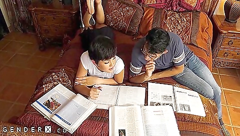 Asian babe in a white t-shirt and black skirt with her round ass