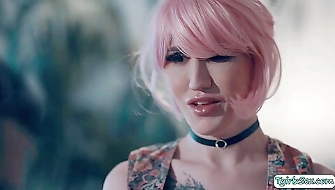 Guy ficks a tattooed shemale in bed in her bareback